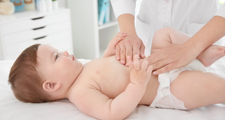 What is the sign of abdominal pain around the navel in a child?