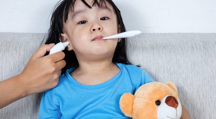 How should parents measure their child's temperature when they have a fever?